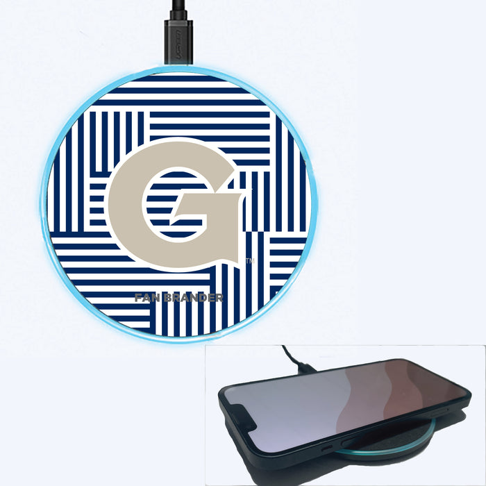 Fan Brander Grey 15W Wireless Charger with Georgetown Hoyas Primary Logo on Geometric Lines Background