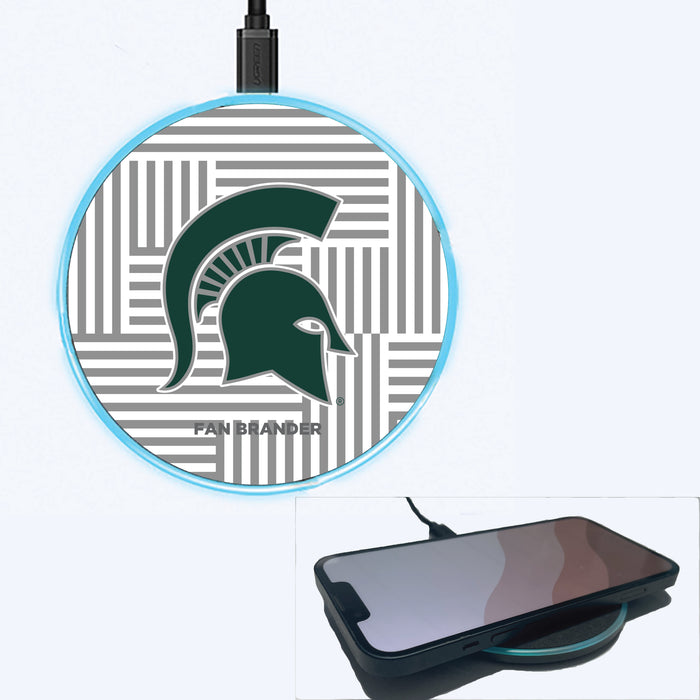 Fan Brander Grey 15W Wireless Charger with Michigan State Spartans Primary Logo on Geometric Lines Background