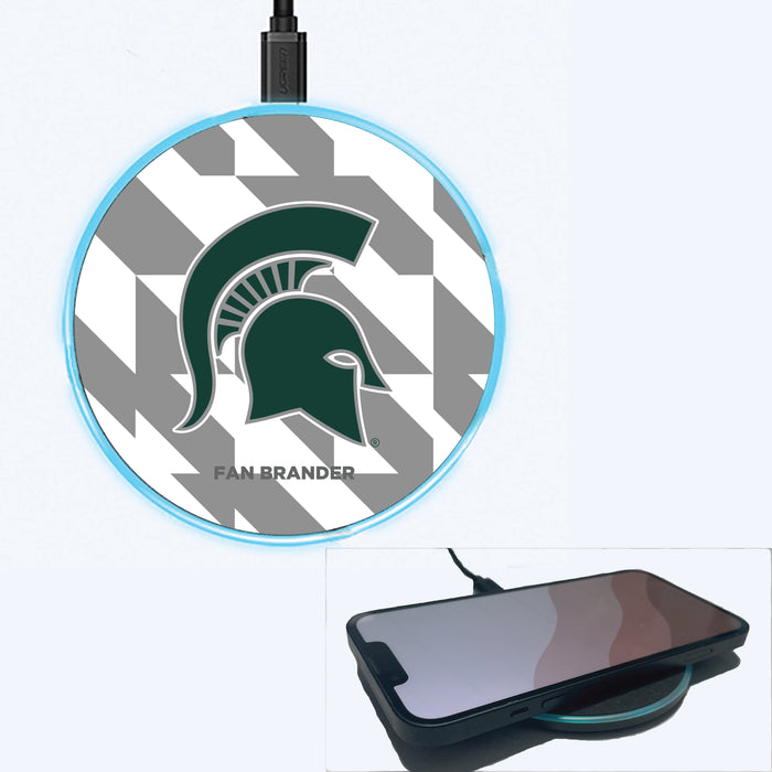 Fan Brander Grey 15W Wireless Charger with Michigan State Spartans Primary Logo on Geometric Quad Background