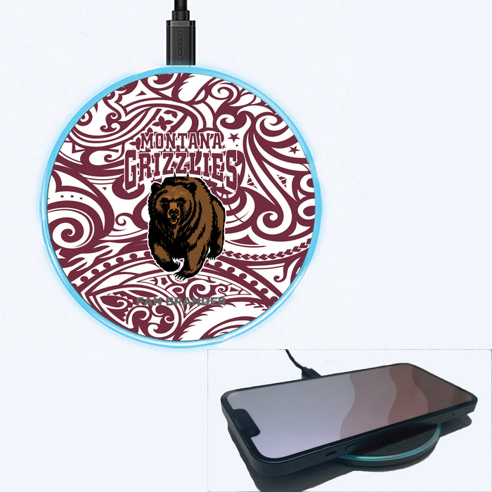 Fan Brander Grey 15W Wireless Charger with Montana Grizzlies Primary Logo With Team Color Tribal Background