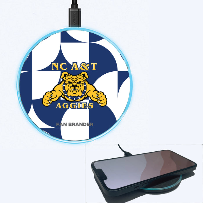 Fan Brander Grey 15W Wireless Charger with North Carolina A&T Aggies Primary Logo on Geometric Circle Background