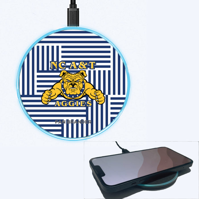 Fan Brander Grey 15W Wireless Charger with North Carolina A&T Aggies Primary Logo on Geometric Lines Background