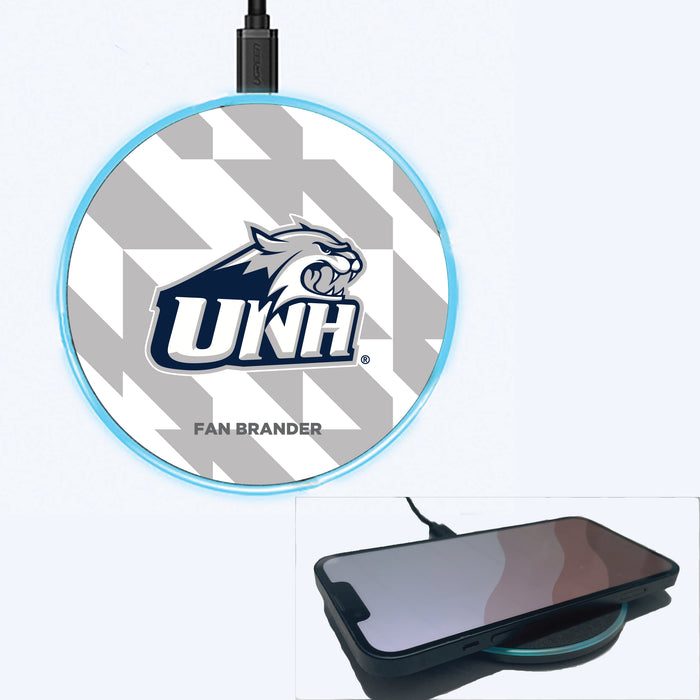 Fan Brander Grey 15W Wireless Charger with New Hampshire Wildcats Primary Logo on Geometric Quad Background