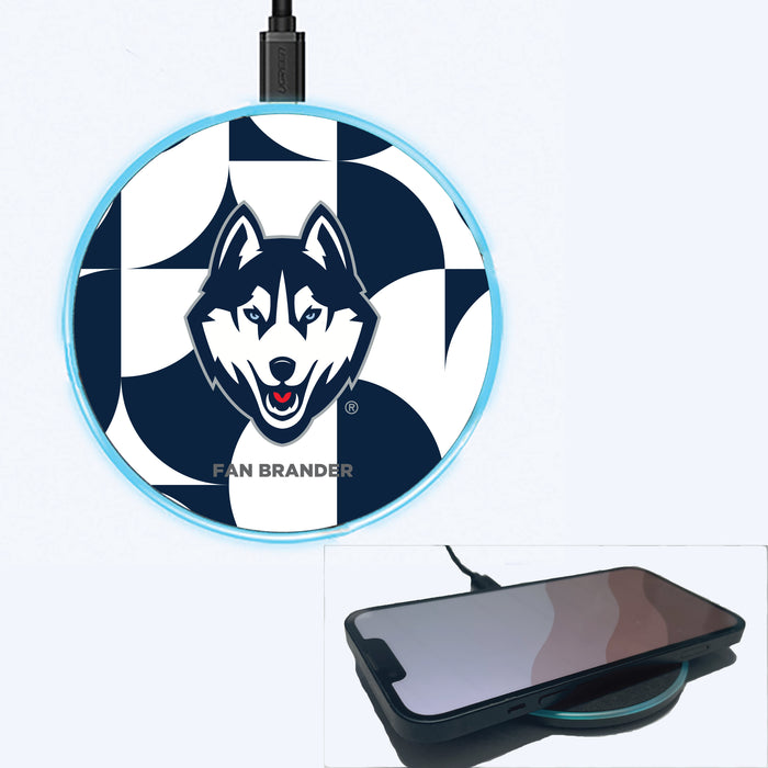 Fan Brander Grey 15W Wireless Charger with Uconn Huskies Primary Logo on Geometric Circle Background