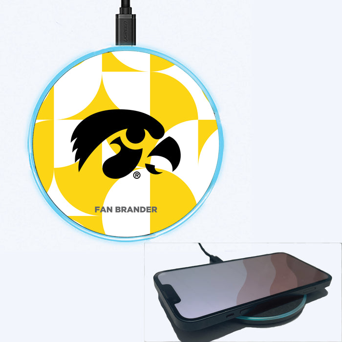 Fan Brander Grey 15W Wireless Charger with Iowa Hawkeyes Primary Logo on Geometric Circle Background