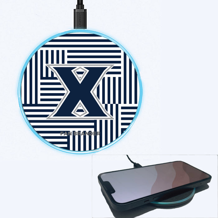 Fan Brander Grey 15W Wireless Charger with Xavier Musketeers Primary Logo on Geometric Lines Background